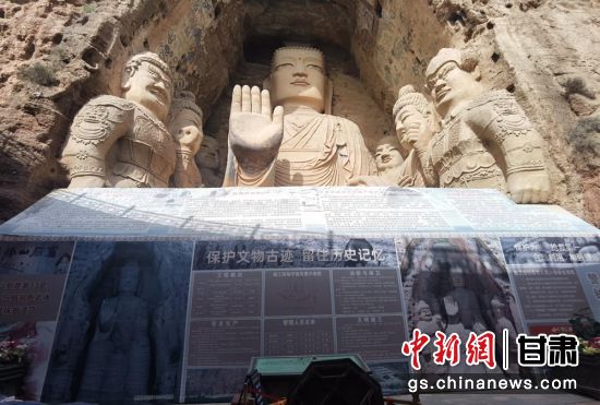 時(shí)下，中國(guó)“石窟鼻祖”天梯山石窟第13窟大佛足部與局部危巖體搶救性保護(hù)項(xiàng)目正在施工。圖為施工現(xiàn)場(chǎng)。陳曉斌 攝