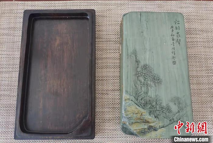 圖為盧保勝為提升洮硯文化內(nèi)涵，制作“一硯一銘、一盒一拓”成品展示?！堟?攝